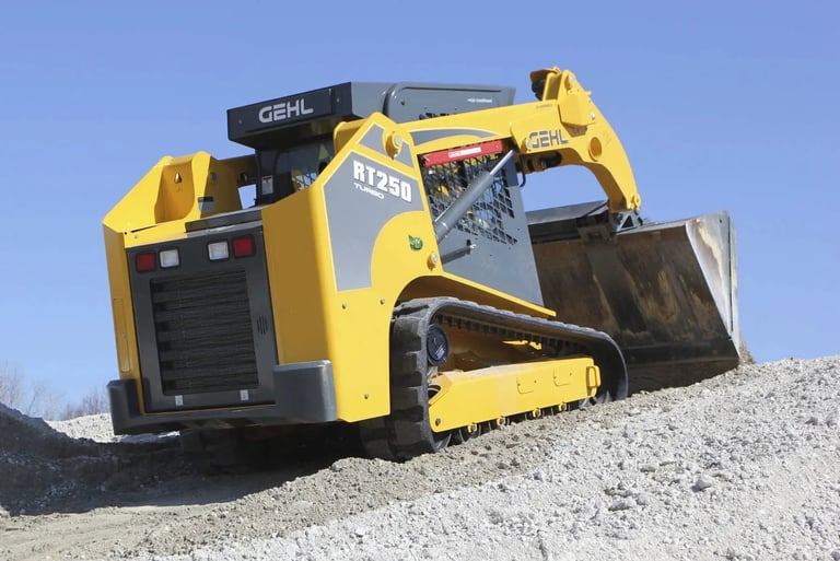Land clearing service in Mission BC - Gehl skid steer loader preparing property for construction